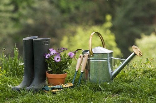 Inspector reviewing garden work with clipboard and notes