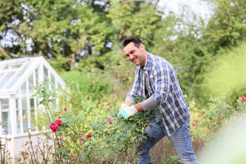 Team using PPE while performing landscaping tasks