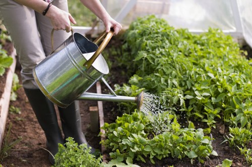 Separated bags of green waste and compostable material in a city garden